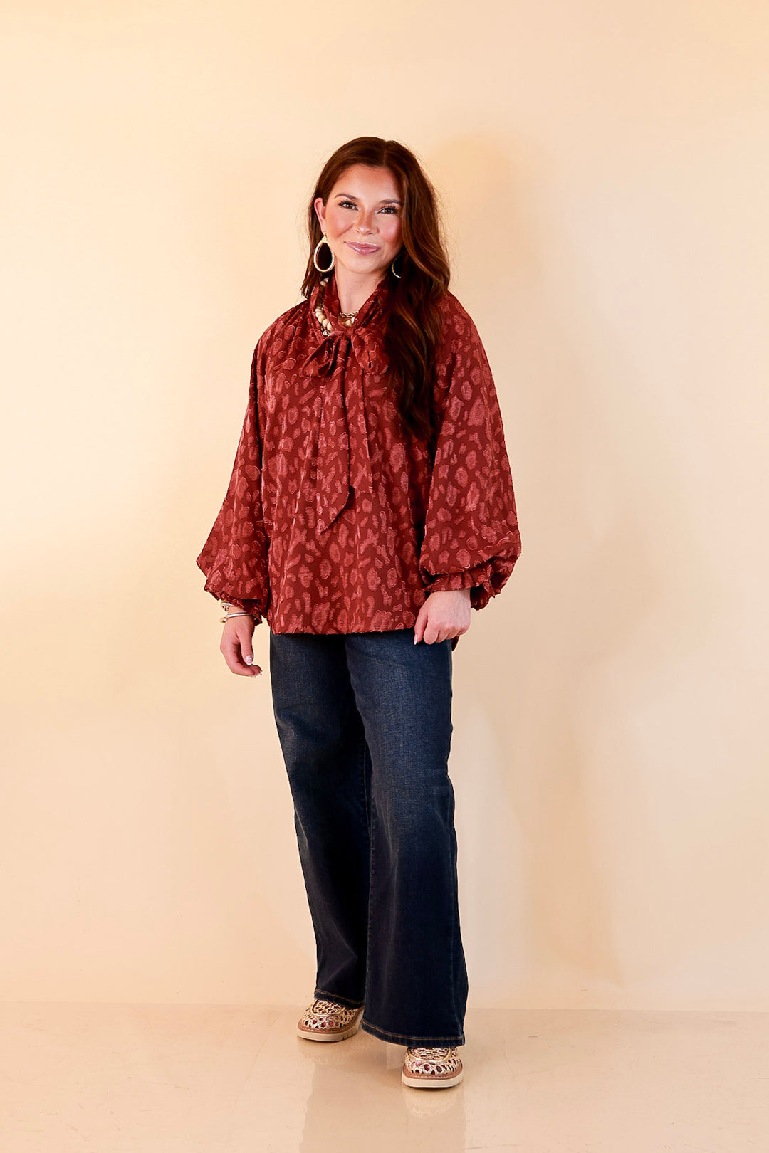 Commanding Attention Tie Neck Velvet Animal Print Balloon Sleeve Blouse in Burgundy