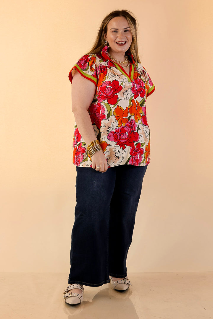 Spring Symphony Floral Print Flutter Sleeve Top with Contrast Trim Split Neckline in Pink and Orange
