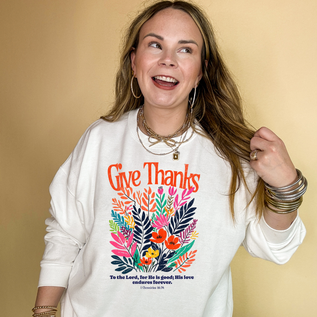 Online Exclusive | 1 Chronicles 16:34 Give Thanks Floral Fusion Graphic Sweatshirt in Multiple Color Options