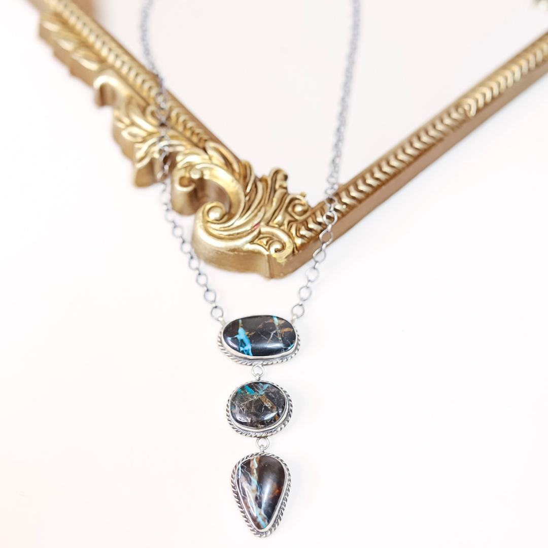 Sterling silver Blue Moon Turquoise necklace by Navajo artist Donovan Nez featuring three stacked stones with a 3.25-inch pendant on a 19-inch chain.