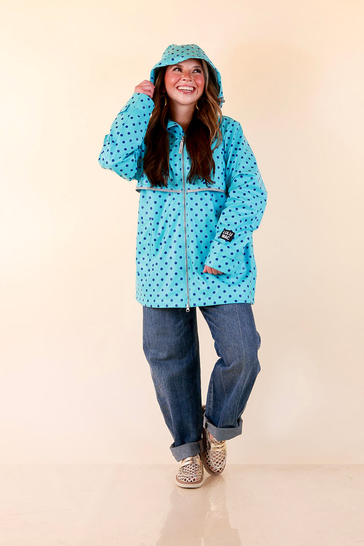 Lulu Mac | Chic Forecast Navy Blue Polka Dot Hooded Rain Jacket in Turquoise Blue