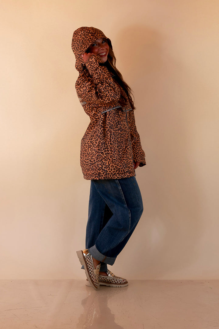 Girly Girl | Chic Forecast Leopard Print Hooded Rain Jacket in Camel Brown