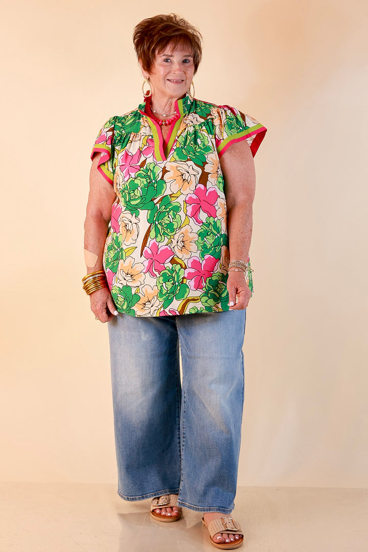 Spring Symphony Floral Print Flutter Sleeve Top with Contrast Trim Split Neckline in Pink and Green
