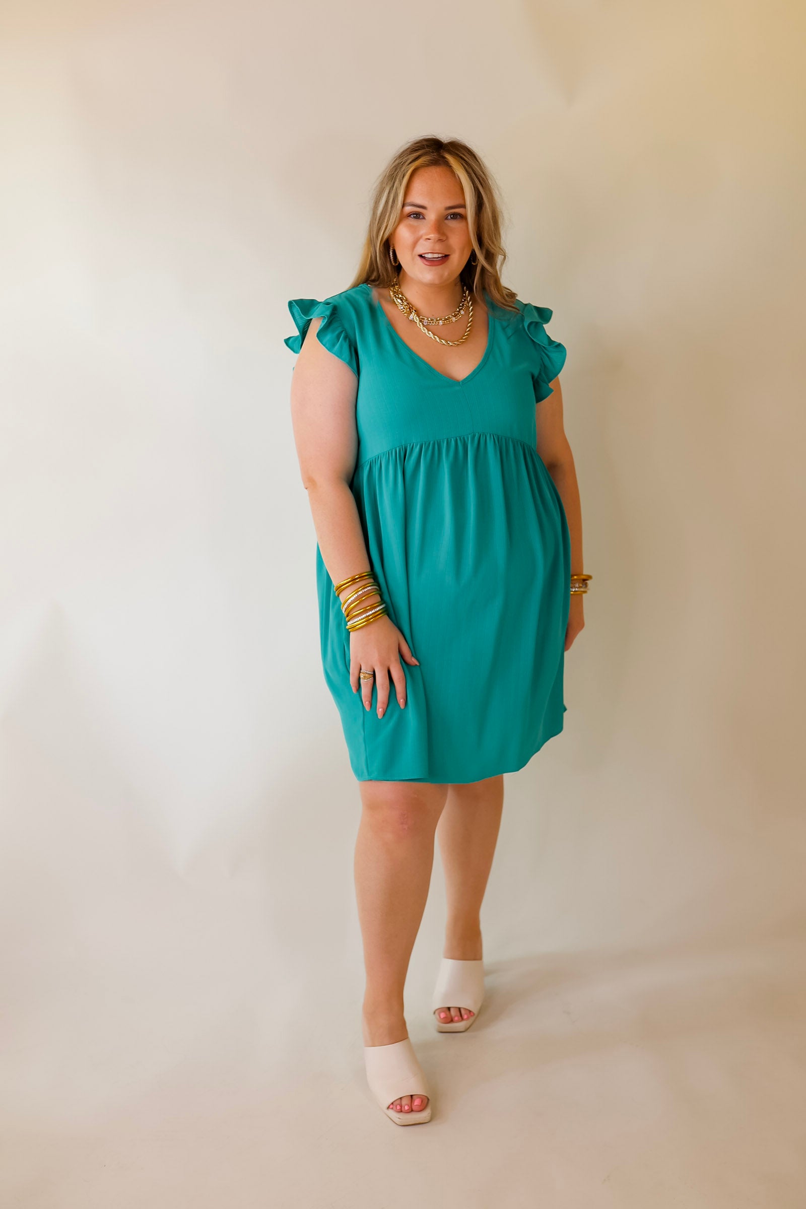 Capture Your Attention V Neck Dress with Ruffle Cap Sleeves in Turquoise - Giddy Up Glamour Boutique