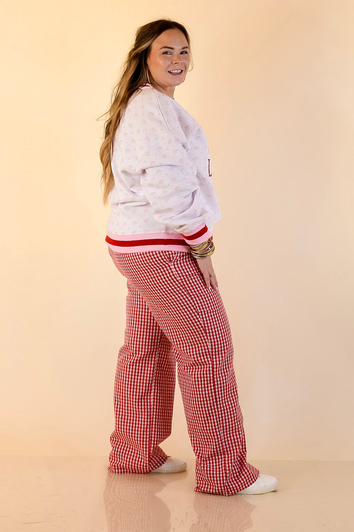 Simply Southern | Holiday Cheer Club Fa La La Floral Varsity Sweatshirt in Ivory