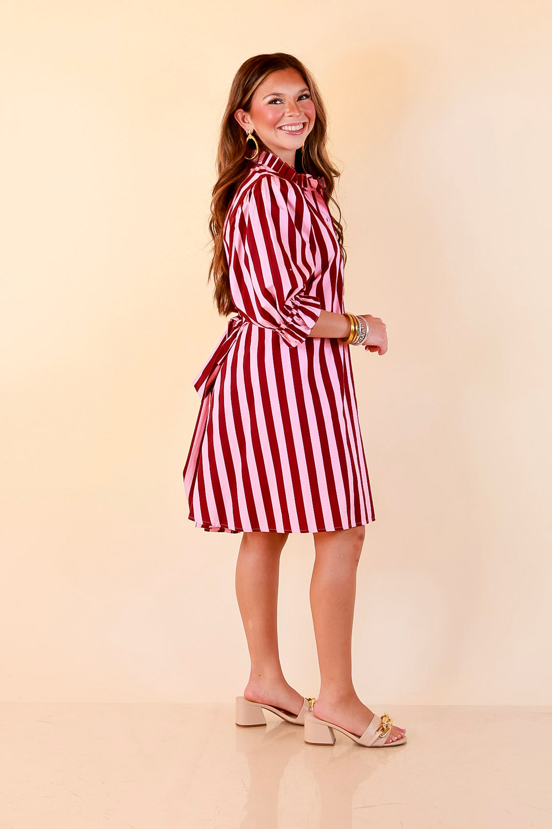 Talk of the Town Striped Ruffle Sleeve Babydoll Dress with Cinched Waist Feature in Maroon and Pink