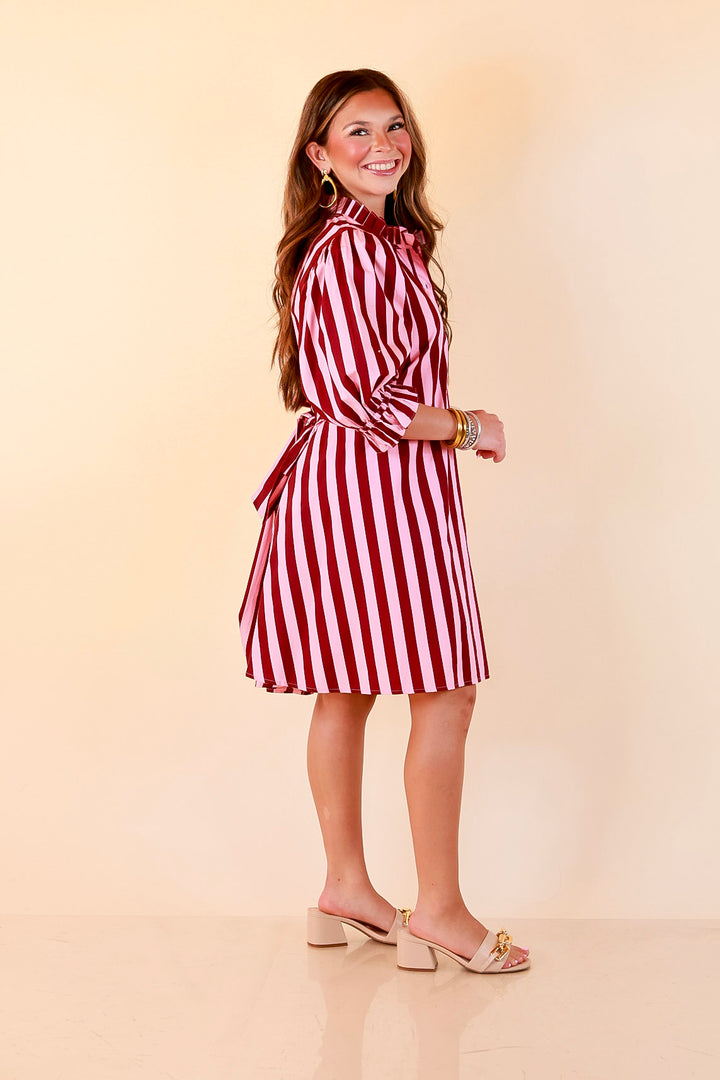 Talk of the Town Striped Ruffle Sleeve Babydoll Dress with Cinched Waist Feature in Maroon and Pink