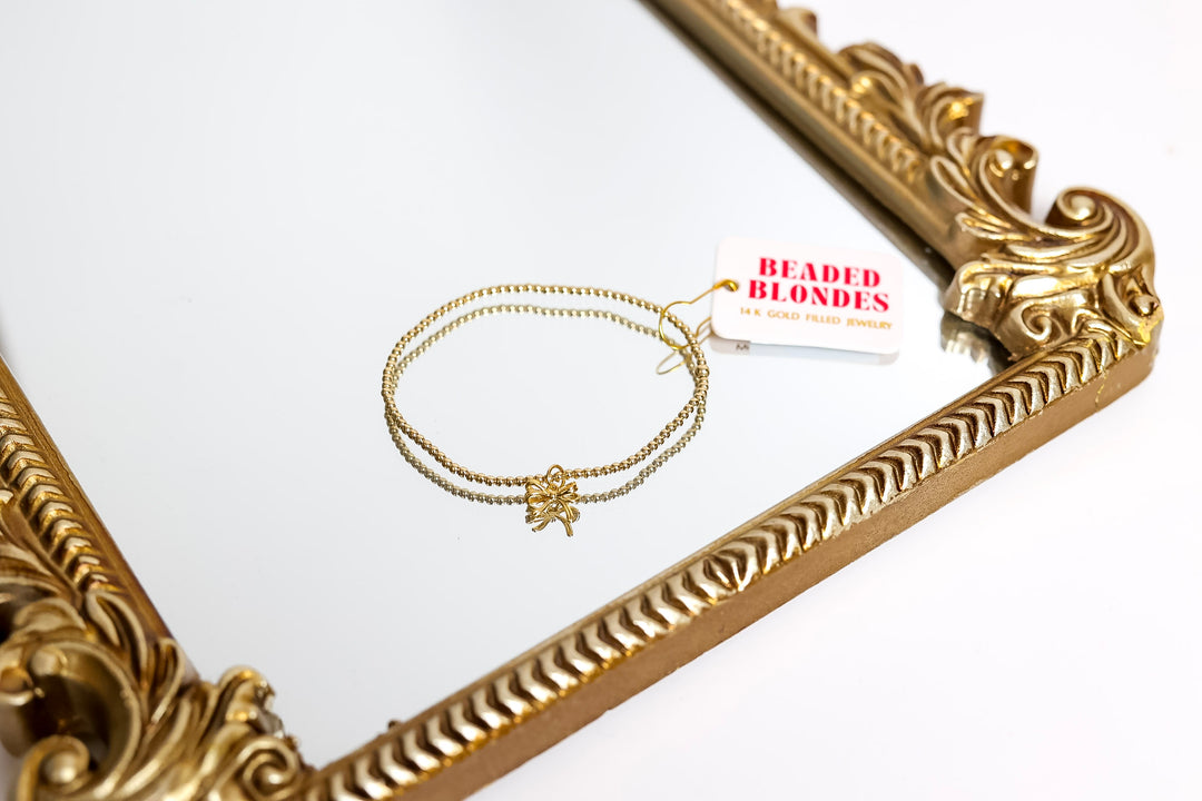 Beaded Blondes | Gold Bow Charm Bracelet