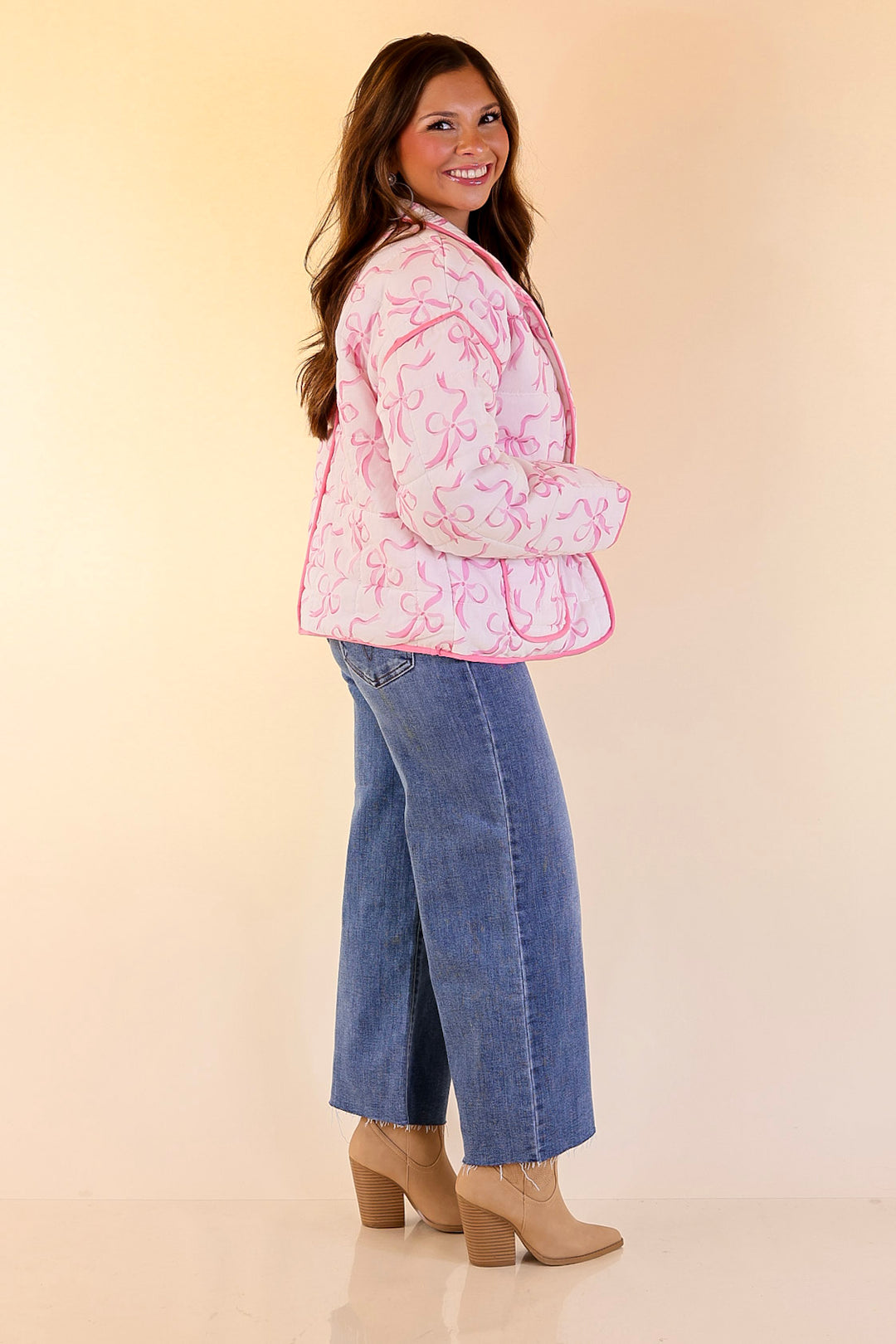 Mud Pie | Cher Quilted Jacket with Pink Bow Print and Pink Piping and Pockets in Off White