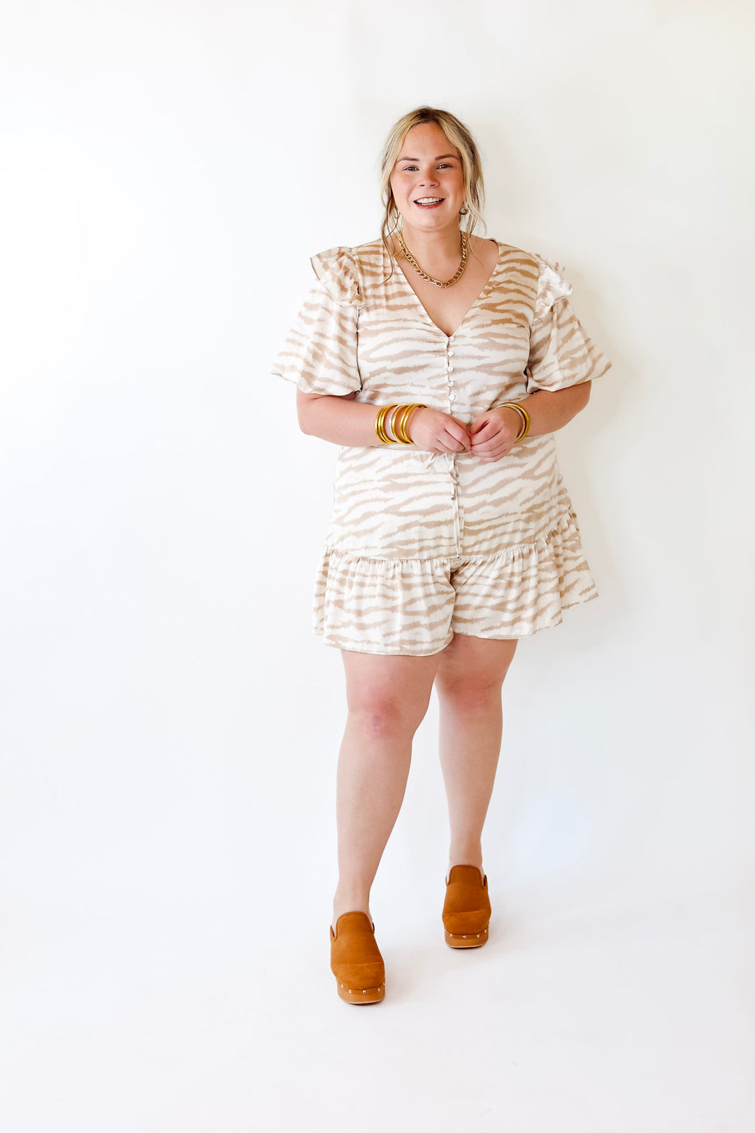 Head Turner Animal Print Romper in Beige and Cream - Giddy Up Glamour Boutique