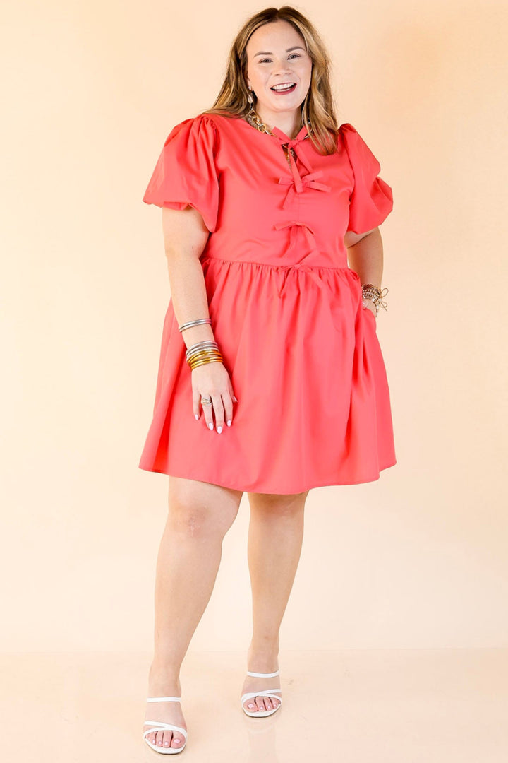 Short and Sweet Dress with Short Puff Sleeves and Bows in Coral Orange