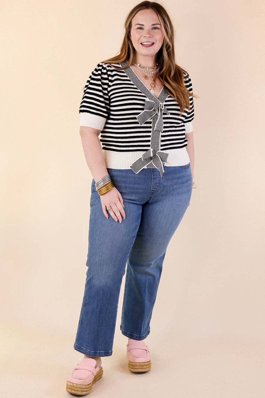 Notice Me Now Short Sleeve V Neck Striped Sweater with Bows in Off White and Black