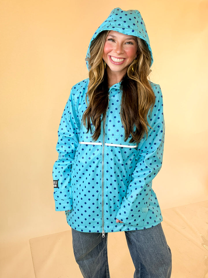 Lulu Mac | Chic Forecast Navy Blue Polka Dot Hooded Rain Jacket in Turquoise Blue