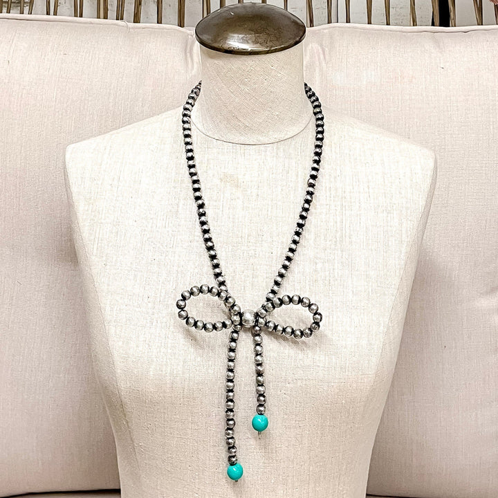 Oh My Bow Silver Beaded Bow Necklace with Turquoise Accents
