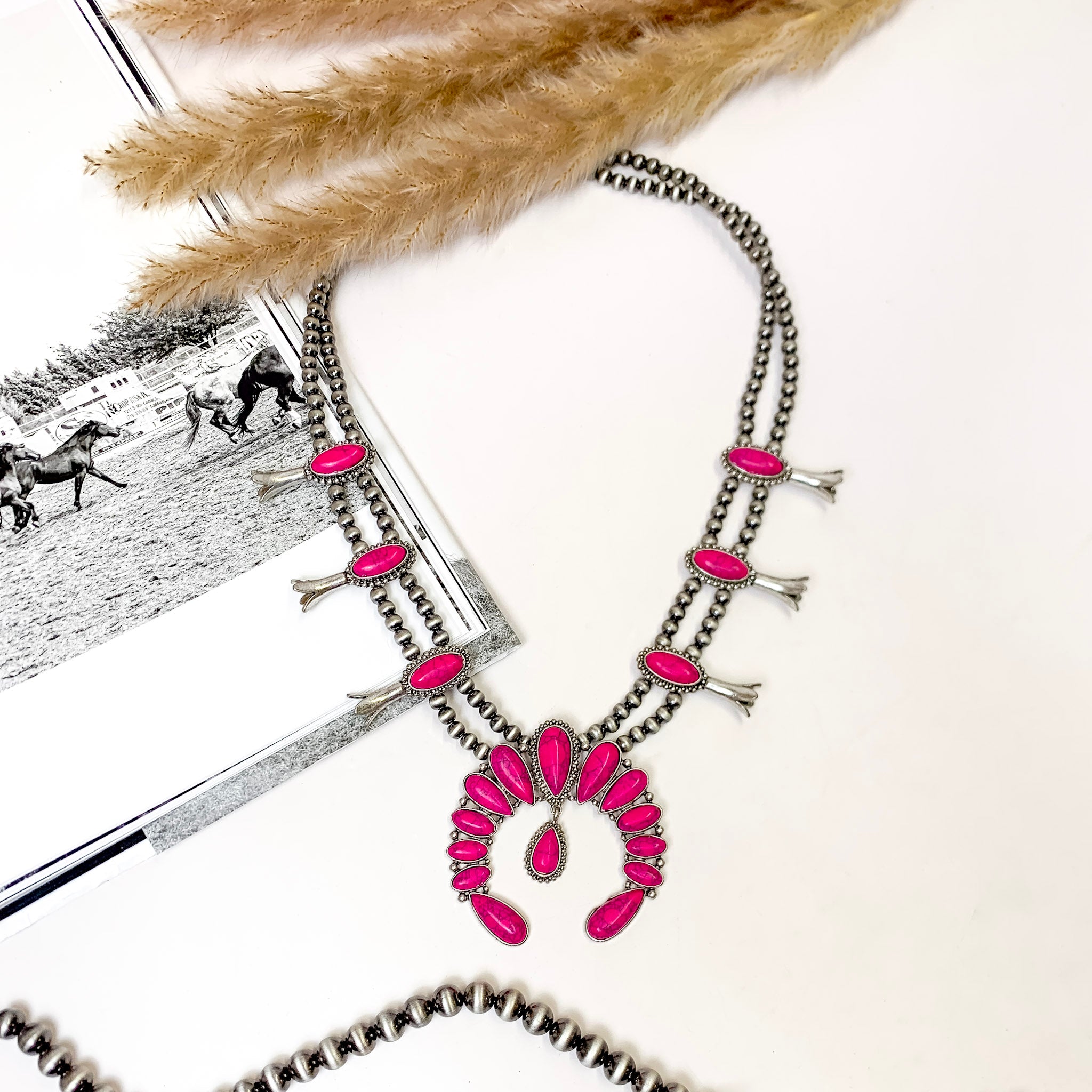 She's Gone Country Squash Blossom Necklace with Naja Pendant and Faux Stone Dangle in Fushcia Pink