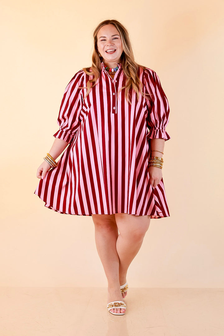 Talk of the Town Striped Ruffle Sleeve Babydoll Dress with Cinched Waist Feature in Maroon and Pink