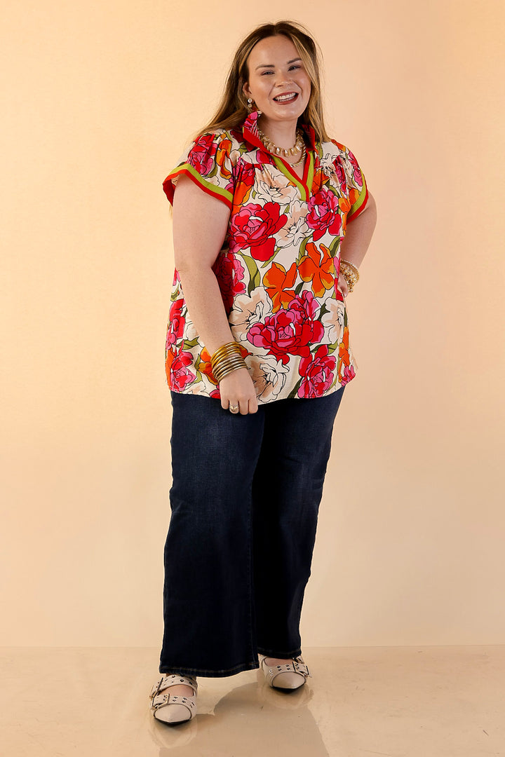 Spring Symphony Floral Print Flutter Sleeve Top with Contrast Trim Split Neckline in Pink and Orange