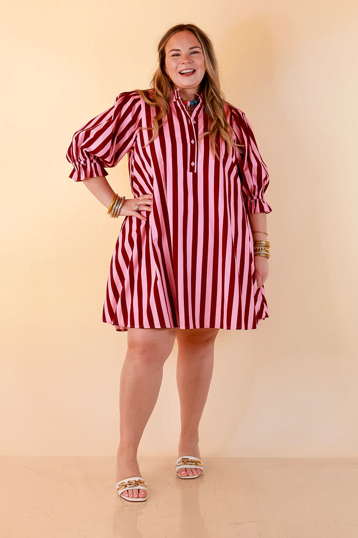 Talk of the Town Striped Ruffle Sleeve Babydoll Dress with Cinched Waist Feature in Maroon and Pink