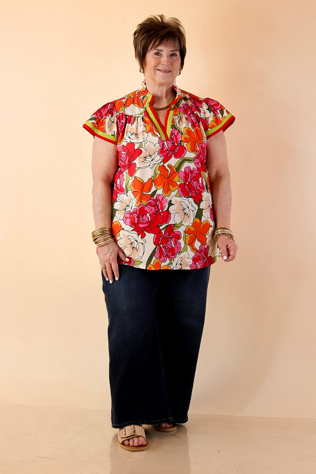 Spring Symphony Floral Print Flutter Sleeve Top with Contrast Trim Split Neckline in Pink and Orange