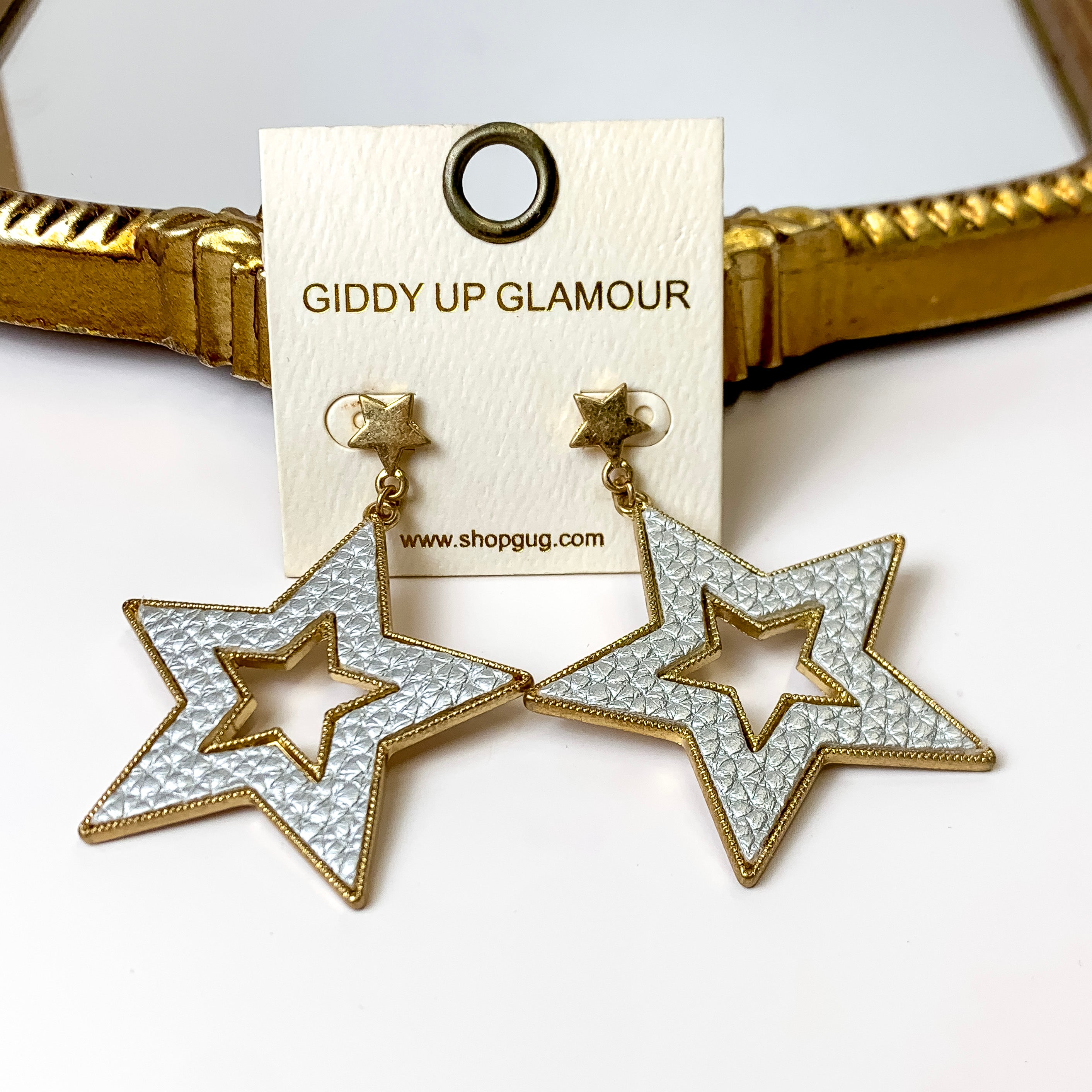 She's a Star Gold Tone Post Dangle Earrings with Leather Star in Silver - Giddy Up Glamour Boutique