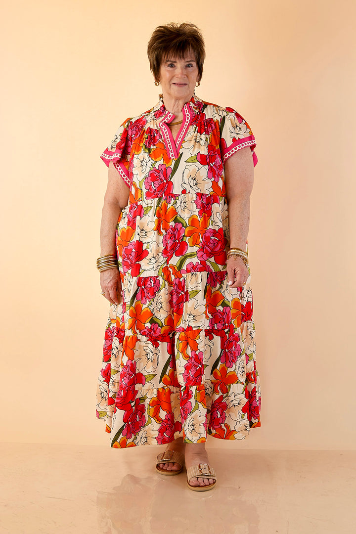 Spring Symphony Floral Print Tiered Midi Dress with Flutter Sleeves in Pink and Orange
