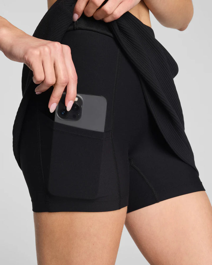 SPANX | AirEssentials® French Rib Skort with Short Lining and Phone Pocket in Black
