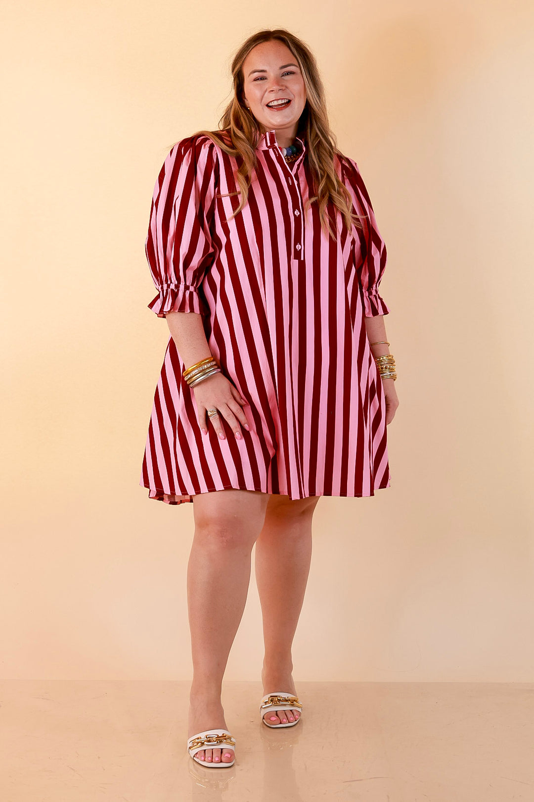 Talk of the Town Striped Ruffle Sleeve Babydoll Dress with Cinched Waist Feature in Maroon and Pink