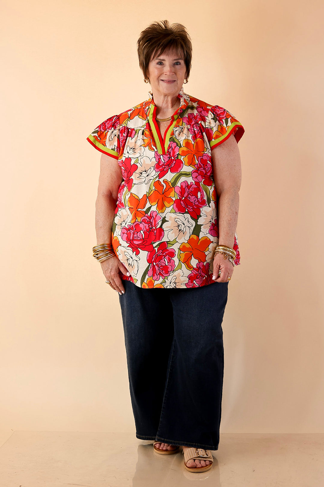 Spring Symphony Floral Print Flutter Sleeve Top with Contrast Trim Split Neckline in Pink and Orange