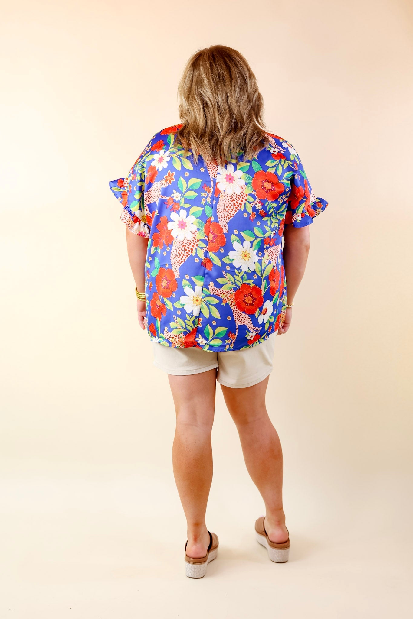 Best Version Floral and Cheetah Print V Neck Top with Ruffle Short Sleeves in Blue - Giddy Up Glamour Boutique