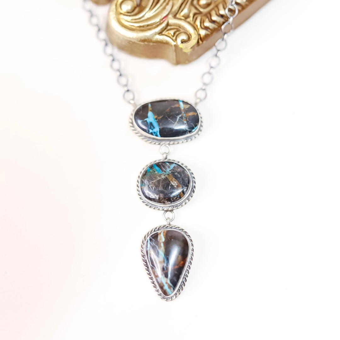 Sterling silver Blue Moon Turquoise necklace by Navajo artist Donovan Nez featuring three stacked stones with a 3.25-inch pendant on a 19-inch chain.