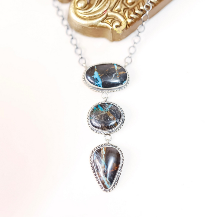 Sterling silver Blue Moon Turquoise necklace by Navajo artist Donovan Nez featuring three stacked stones with a 3.25-inch pendant on a 19-inch chain.