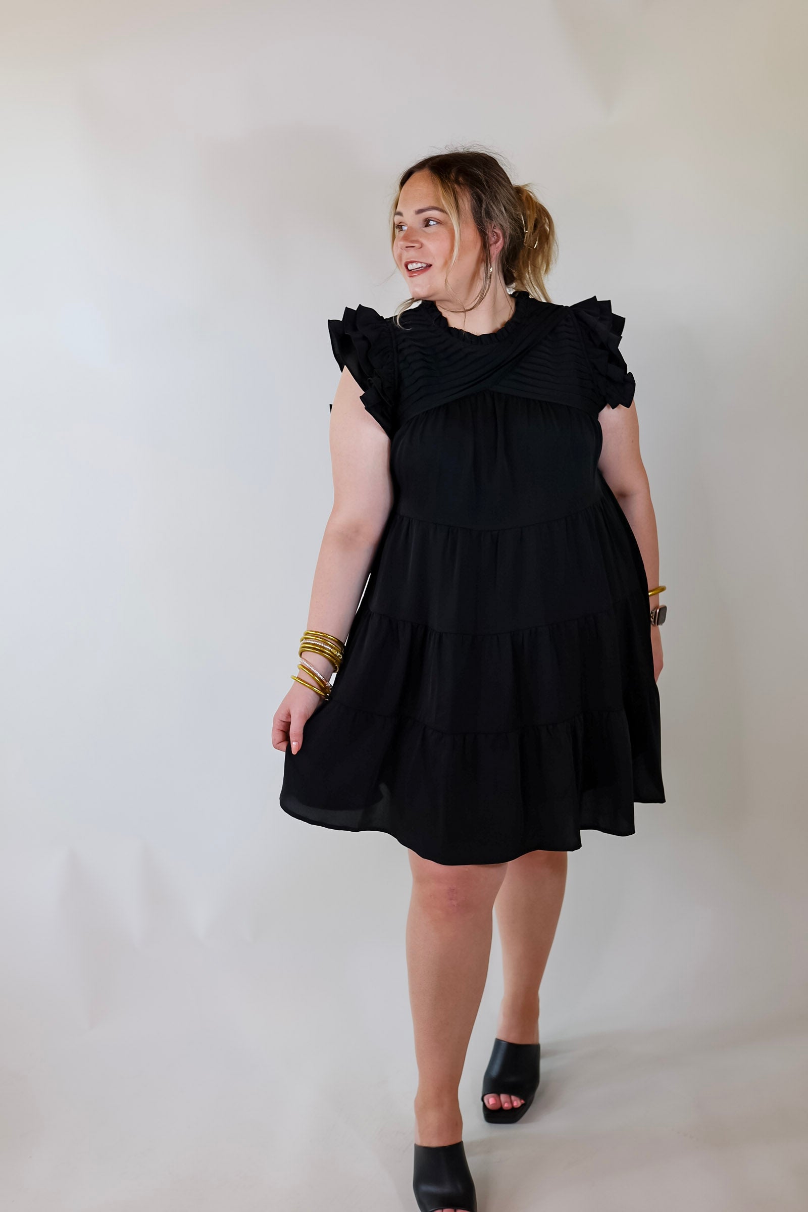 Chic On Scene Ruffle Tiered Dress with Pleated Detailing in Black - Giddy Up Glamour Boutique