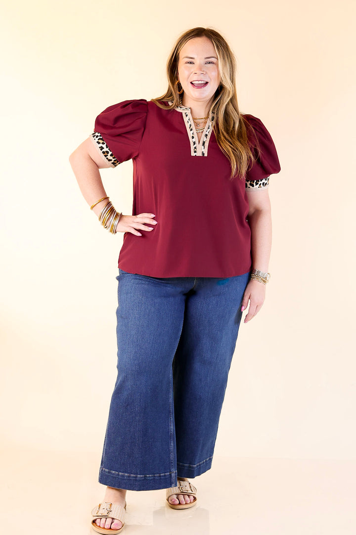 Standout Style V Neck Top with Short Balloon Sleeves and Leopard Print Trim in Maroon