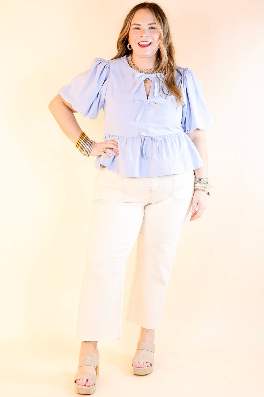 Simply Stunning Short Puff Sleeve Peplum Top with Bow Tie Detailing in Baby Blue