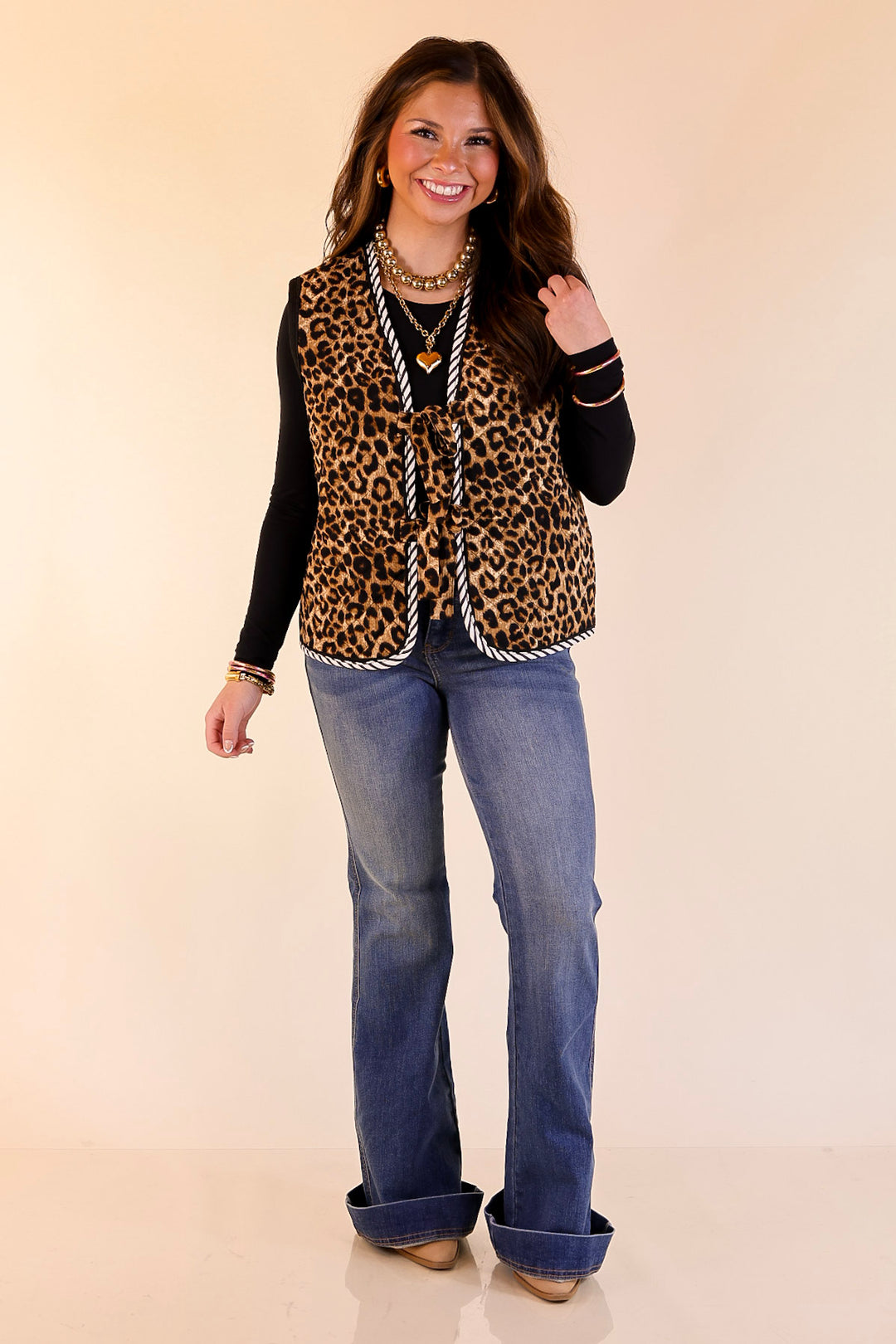 Wildly Chic Quilted Puffer Vest with Stripe Trim and Black Piping in Leopard Print