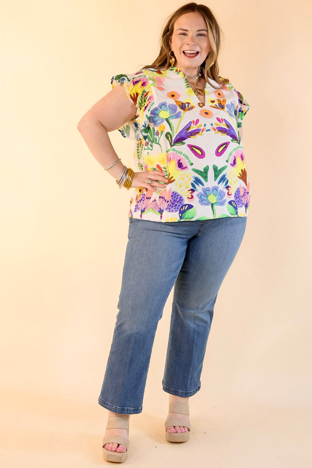 Island Escape Floral Print Top with Ruffle Cap Sleeves and Notched Neckline in Green Mix