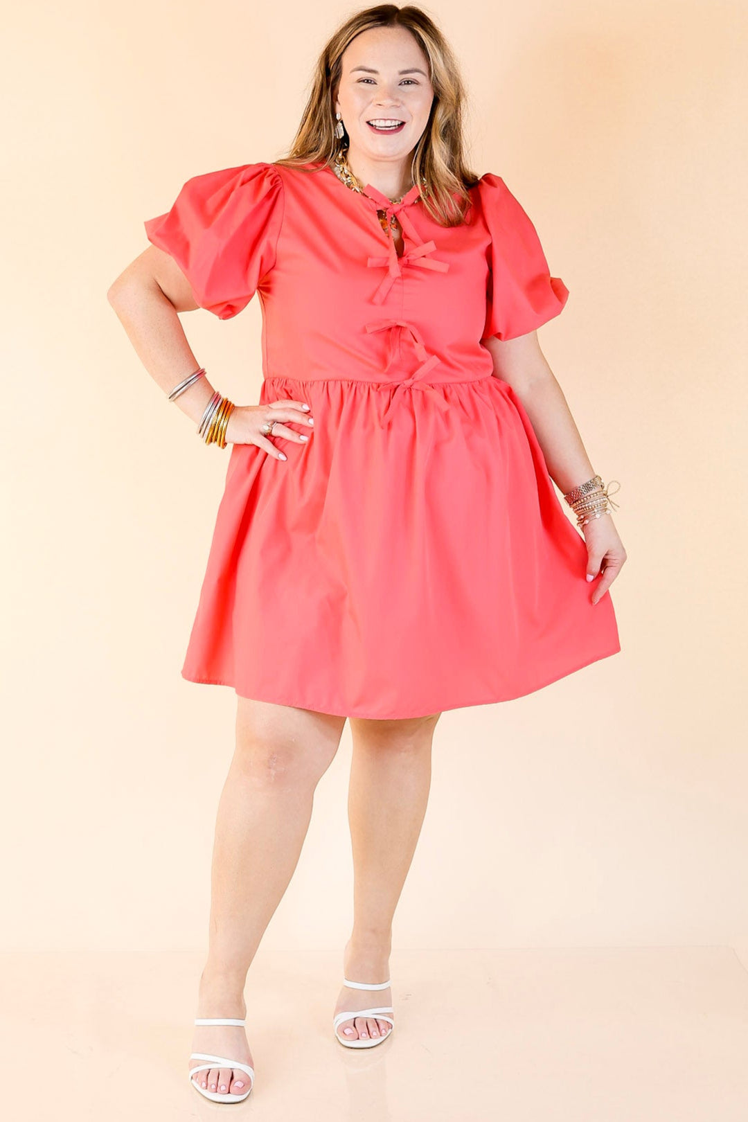 Short and Sweet Dress with Short Puff Sleeves and Bows in Coral Orange