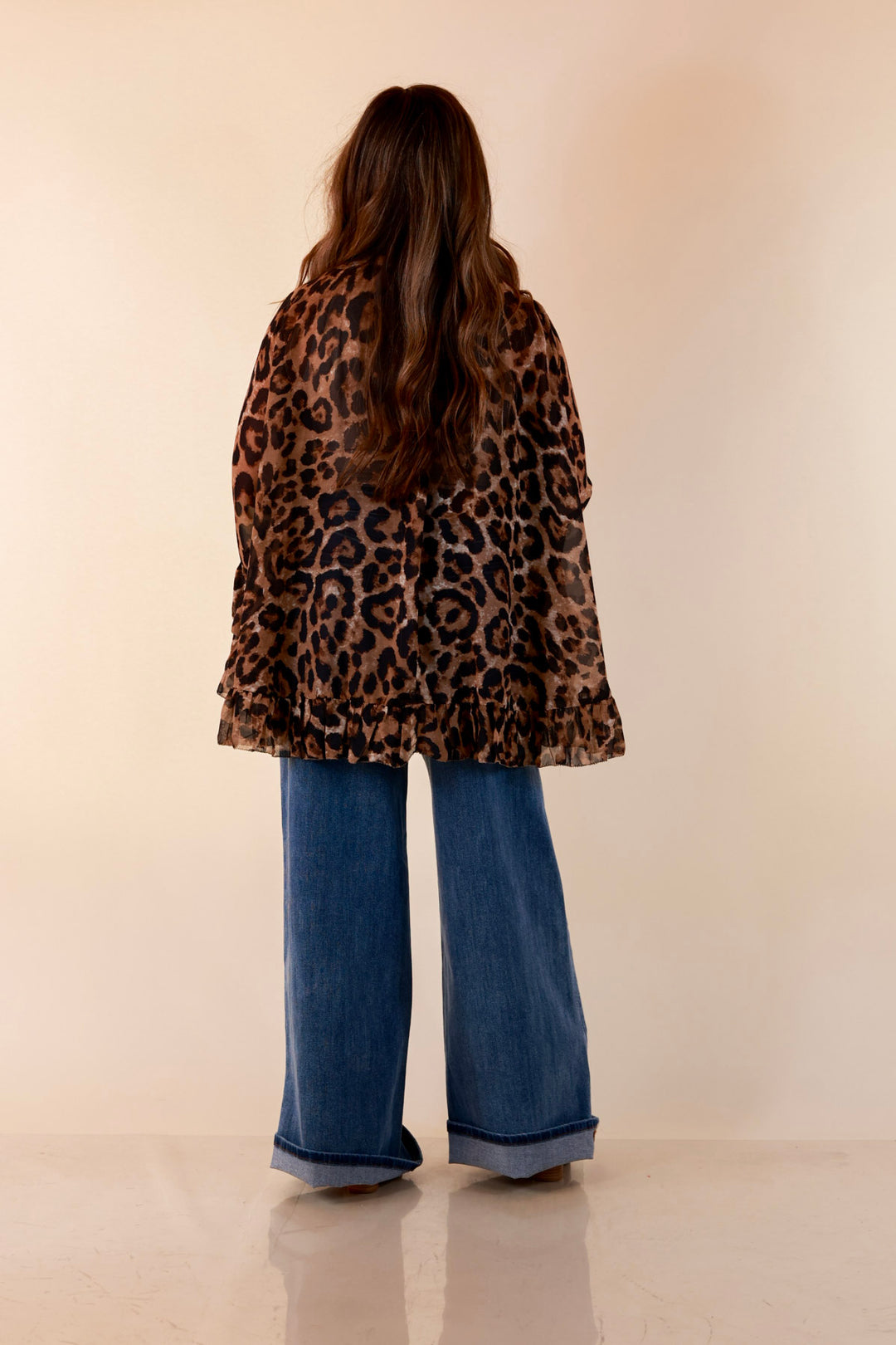 Flirt Factor Long Sleeve Sheer Blouse with Bell Sleeves and Ruffle Detailing and Tie Collar in Leopard Print