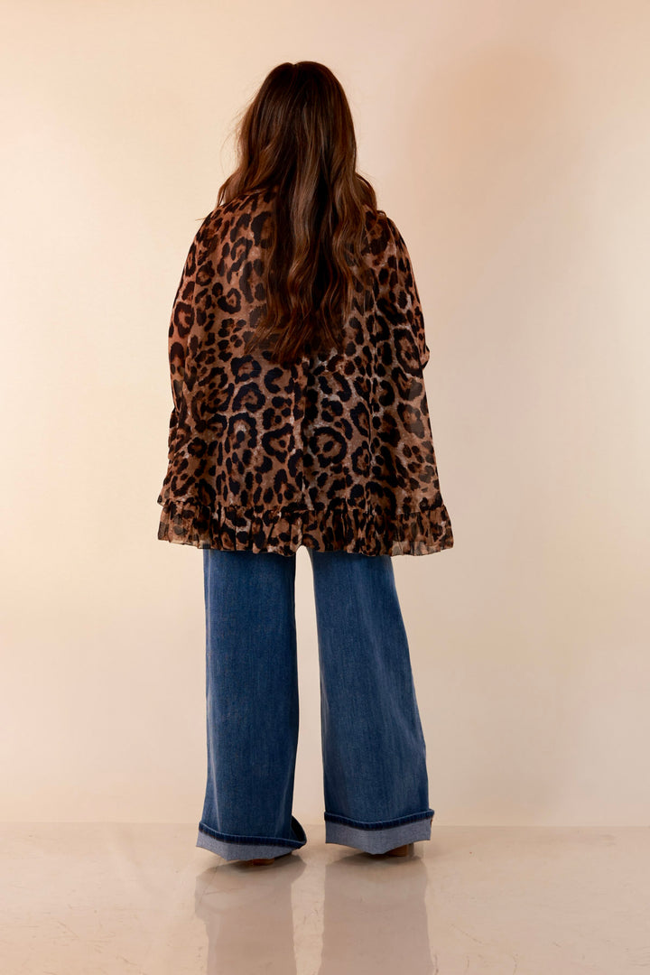 Flirt Factor Long Sleeve Sheer Blouse with Bell Sleeves and Ruffle Detailing and Tie Collar in Leopard Print