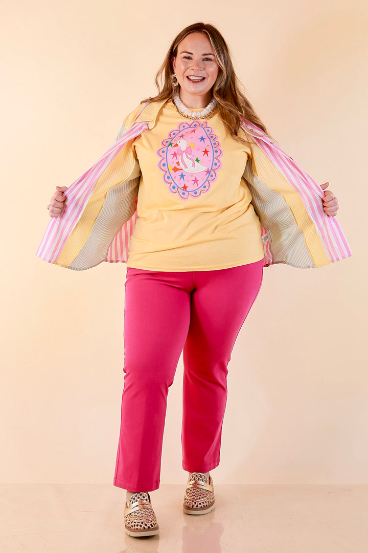 Goose on the Loose Whimsical Pink Background with Stars and Hearts Goose Printed Graphic Tee in Butter Yellow