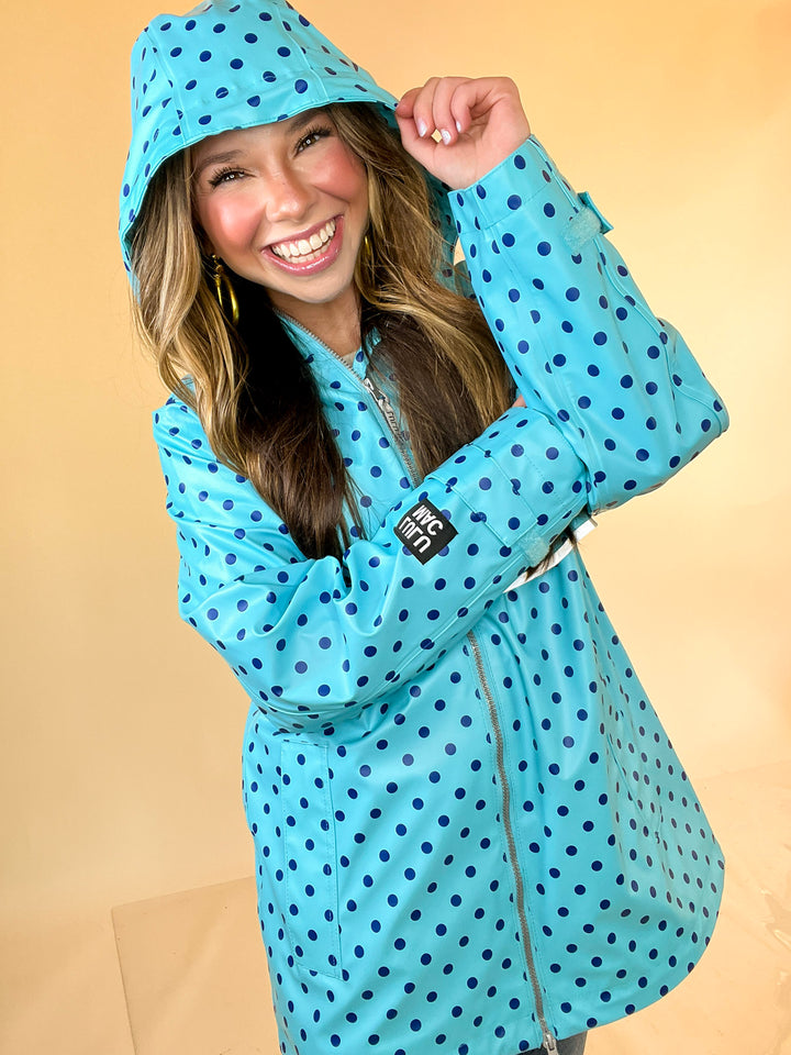 Lulu Mac | Chic Forecast Navy Blue Polka Dot Hooded Rain Jacket in Turquoise Blue