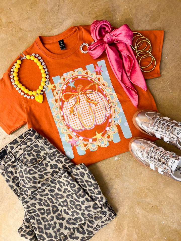 Sweet on the Season Gingham Pumpkin, Stripe and Polka Dot Design with Bow Detail Fall Graphic Tee in Rust Orange