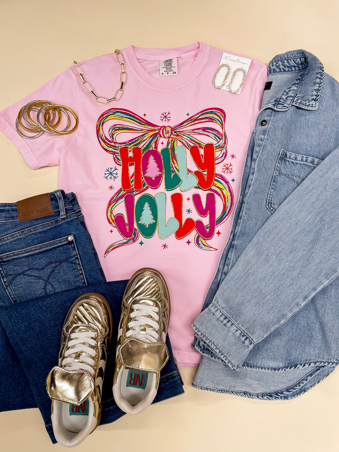 Last Chance Size 3XL | Holly Jolly Colorful Bow Christmas Graphic on Short Sleeve Comfort Color Tee in Pink - Giddy Up Glamour Boutique