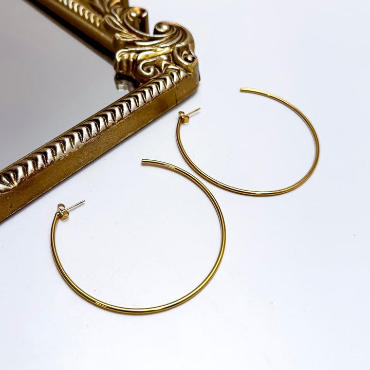 CHANSUTT PEARLS | Thin Large Hoop Earrings in Gold