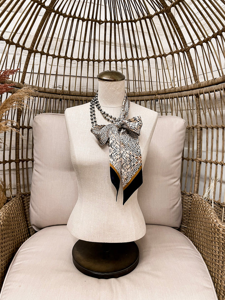 Wyoming Traders | Leopard Print Charmeuse Silk Twilly Scarf in Tan