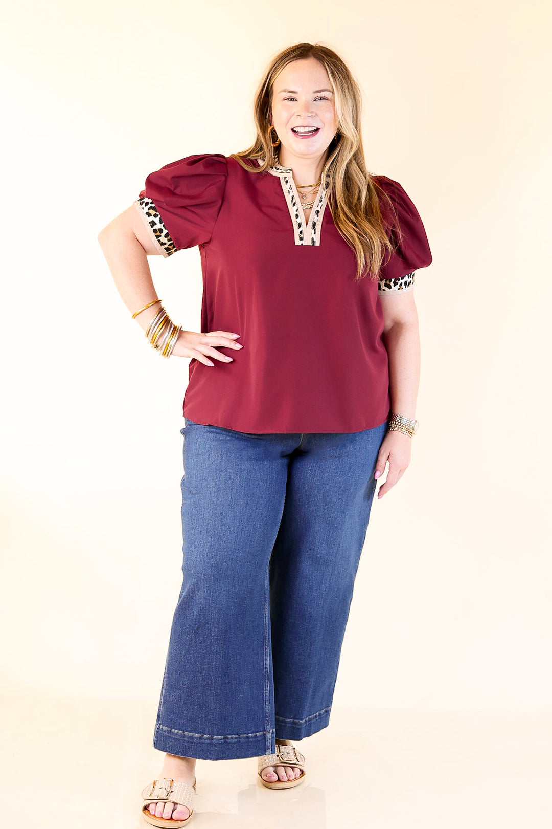 Standout Style V Neck Top with Short Balloon Sleeves and Leopard Print Trim in Maroon