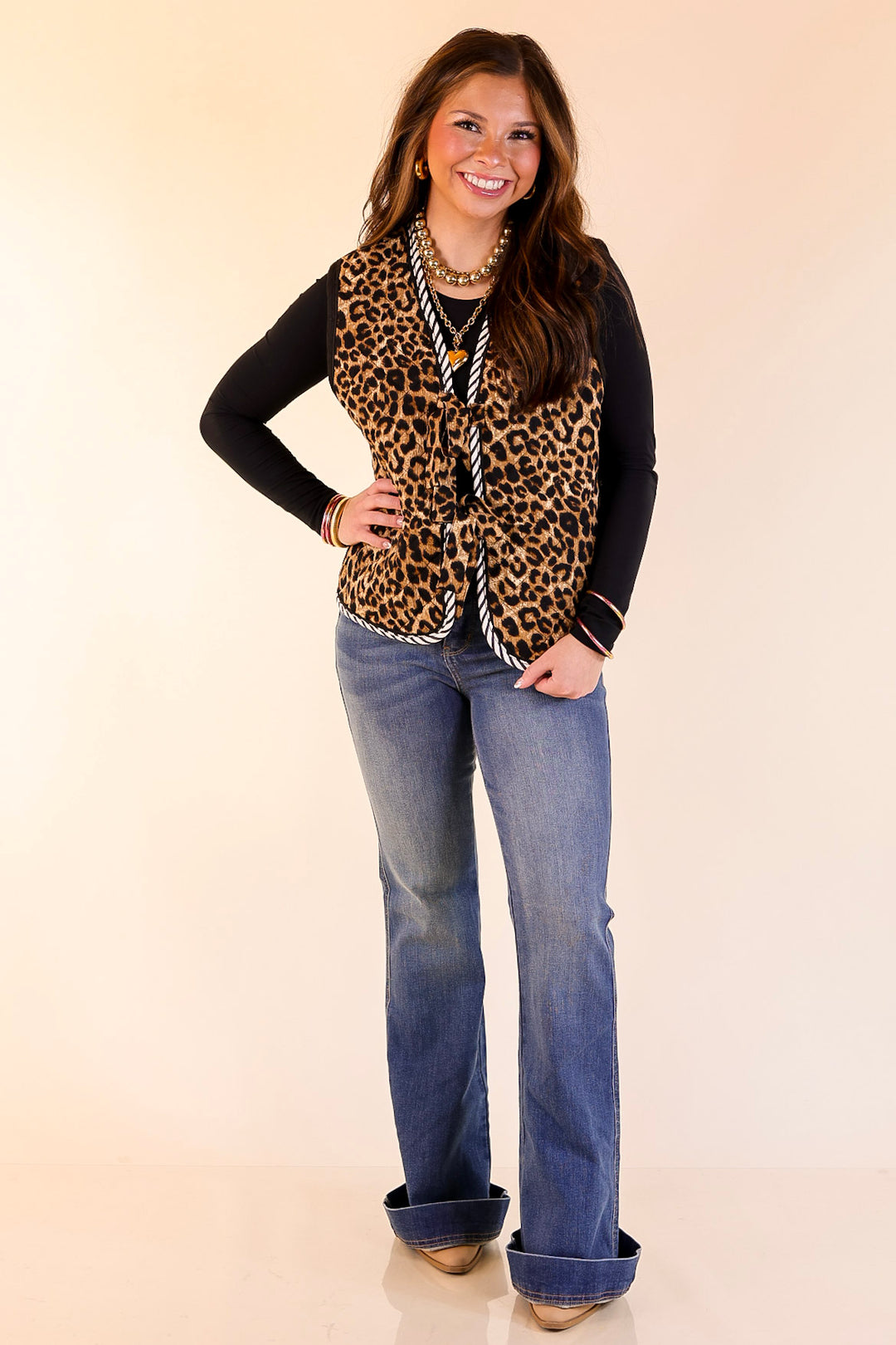 Wildly Chic Quilted Puffer Vest with Stripe Trim and Black Piping in Leopard Print