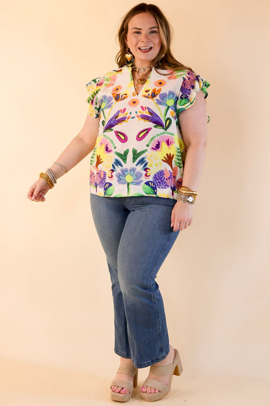 Island Escape Floral Print Top with Ruffle Cap Sleeves and Notched Neckline in Green Mix