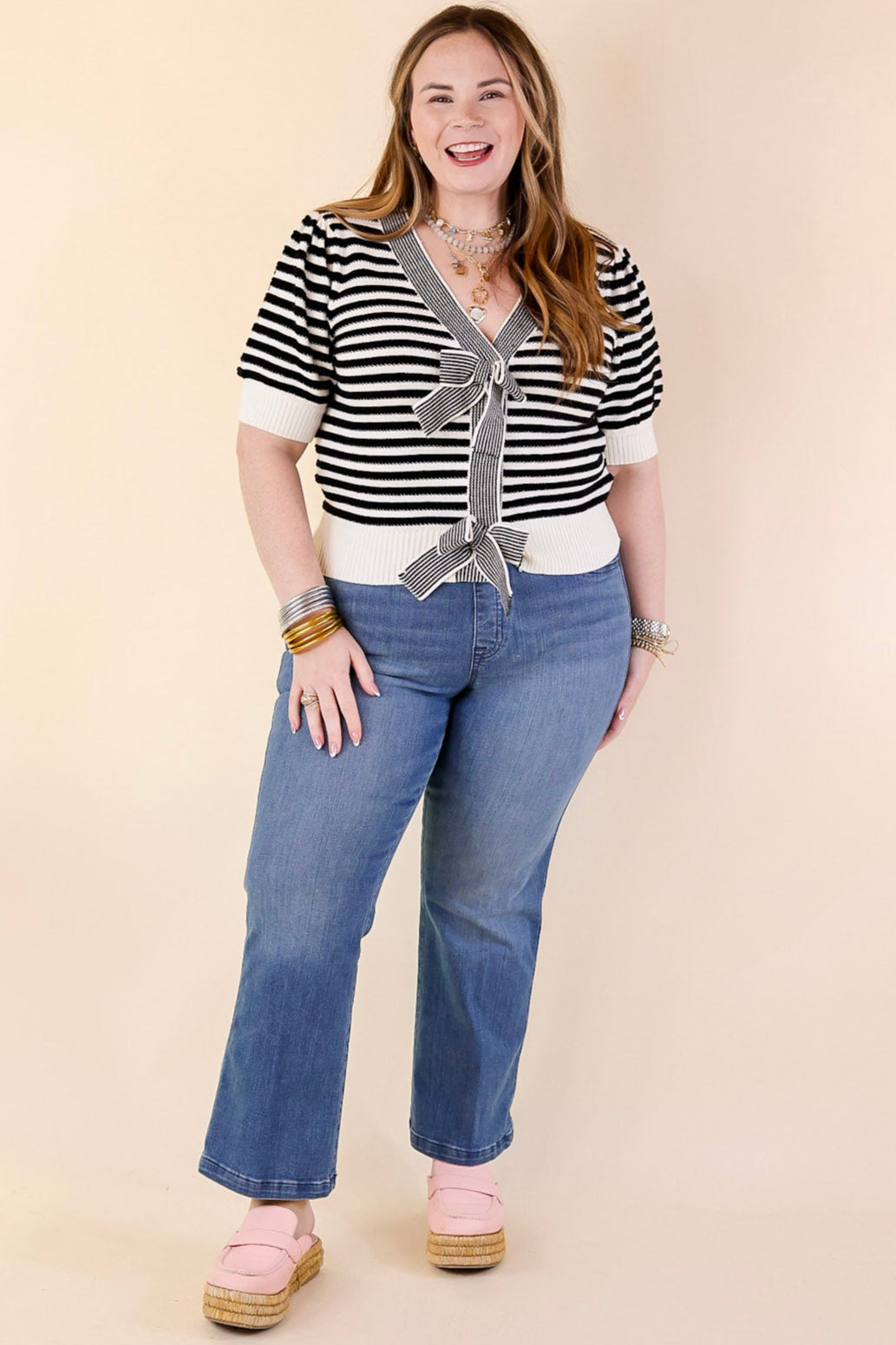 Notice Me Now Short Sleeve V Neck Striped Sweater with Bows in Off White and Black