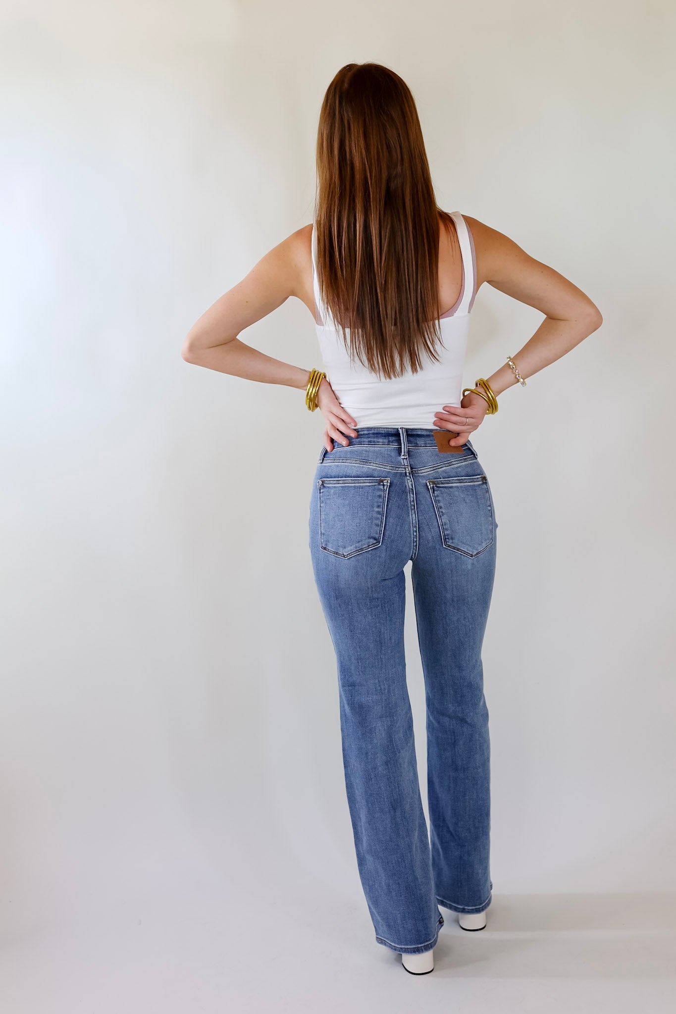 Judy Blue | Venture Out Button Fly Bootcut Jeans in Light-Medium Wash - Giddy Up Glamour Boutique